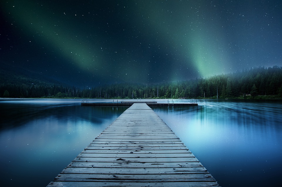 Bathing lake with jetty at night