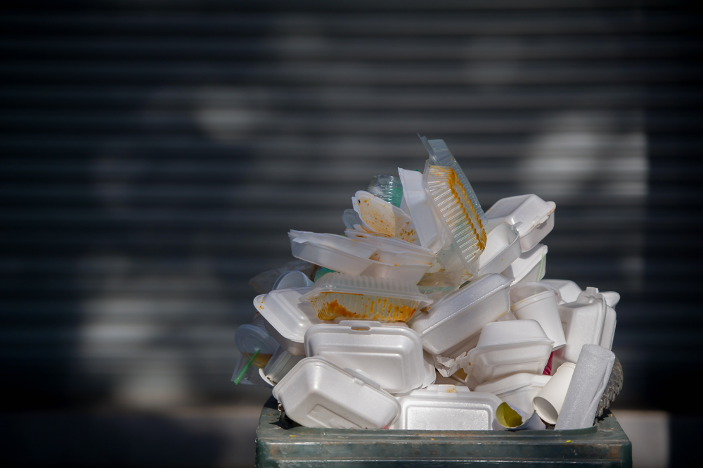 pile of waste foam and plastic in bin.