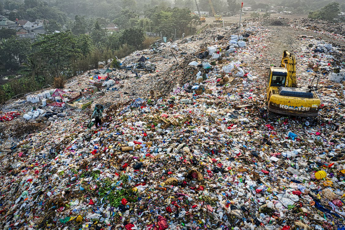 Drone shot of a landfill with a lot of plastic waste in Indonesia.